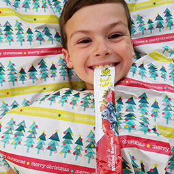 boy smiling healthy snack food bed UGC branded content