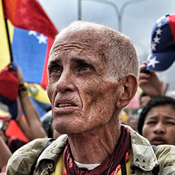 man fighting argentina protest protesting flag resistencia freedom anarchy content travel real UGC photography